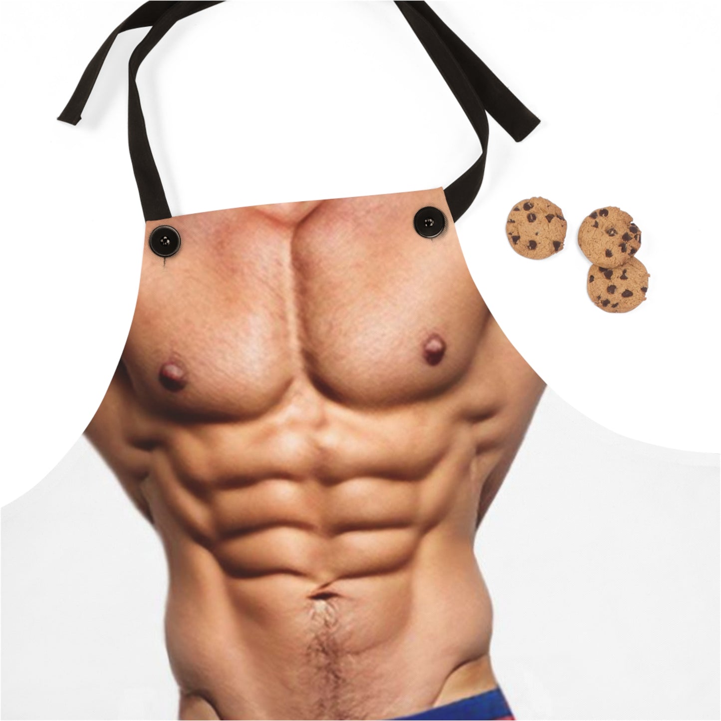 A novelty apron designed to appear as a muscular male torso wearing white briefs with a red heart pattern