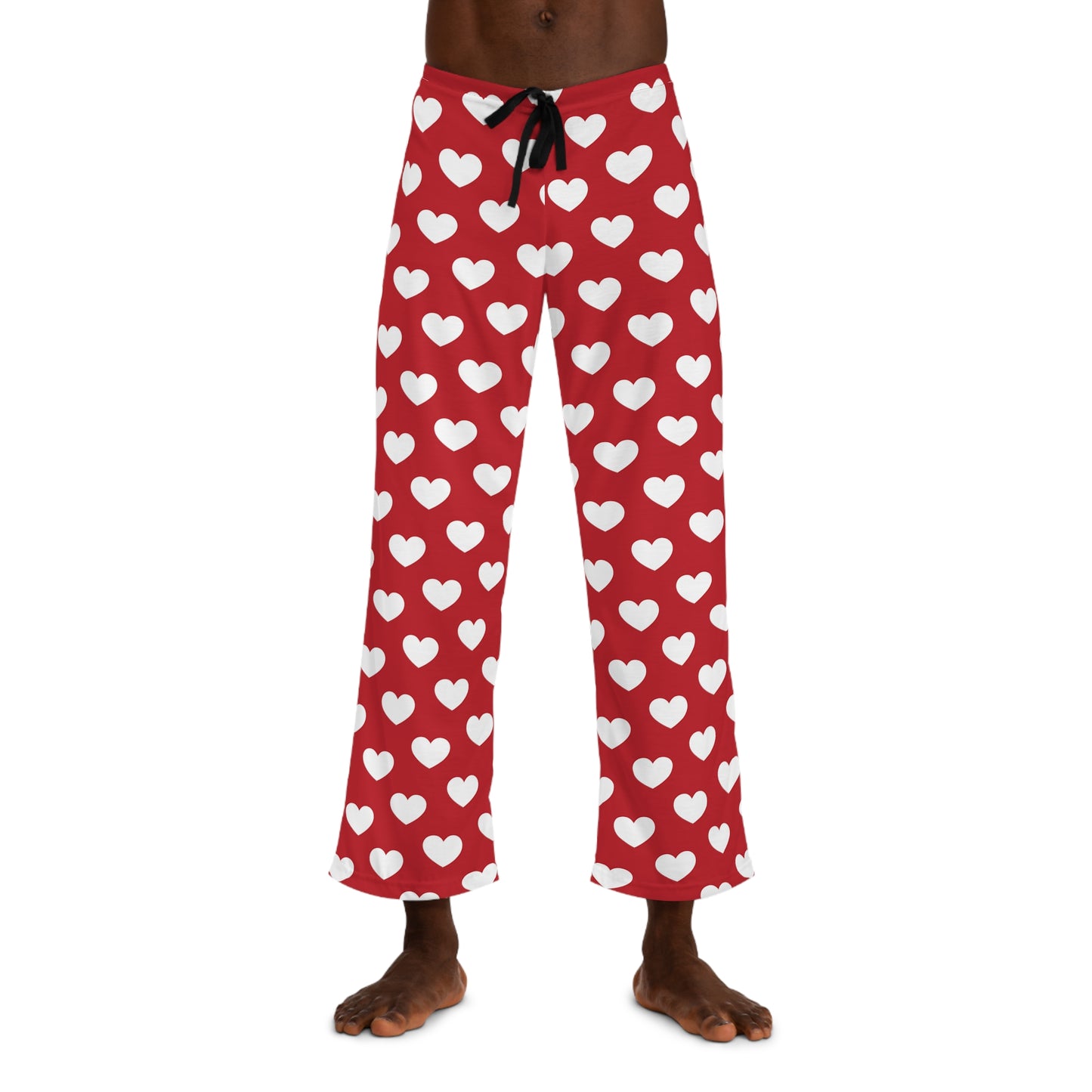 Red pajama bottoms with an all-over print of white hearts, complete with a comfortable black tie at the waist for adjustment