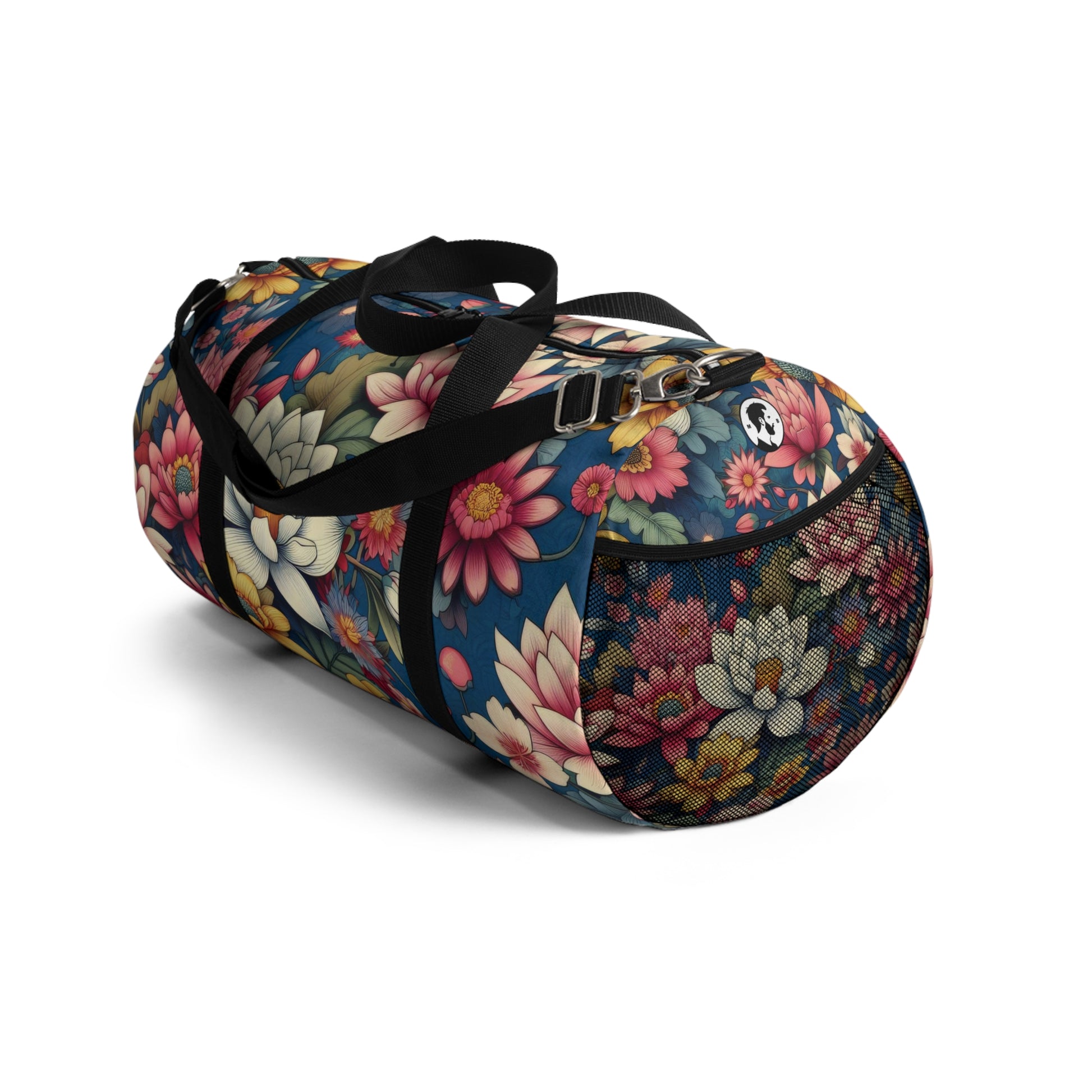 The image depicts a cylindrical duffel bag with a colorful floral pattern and a black shoulder strap.