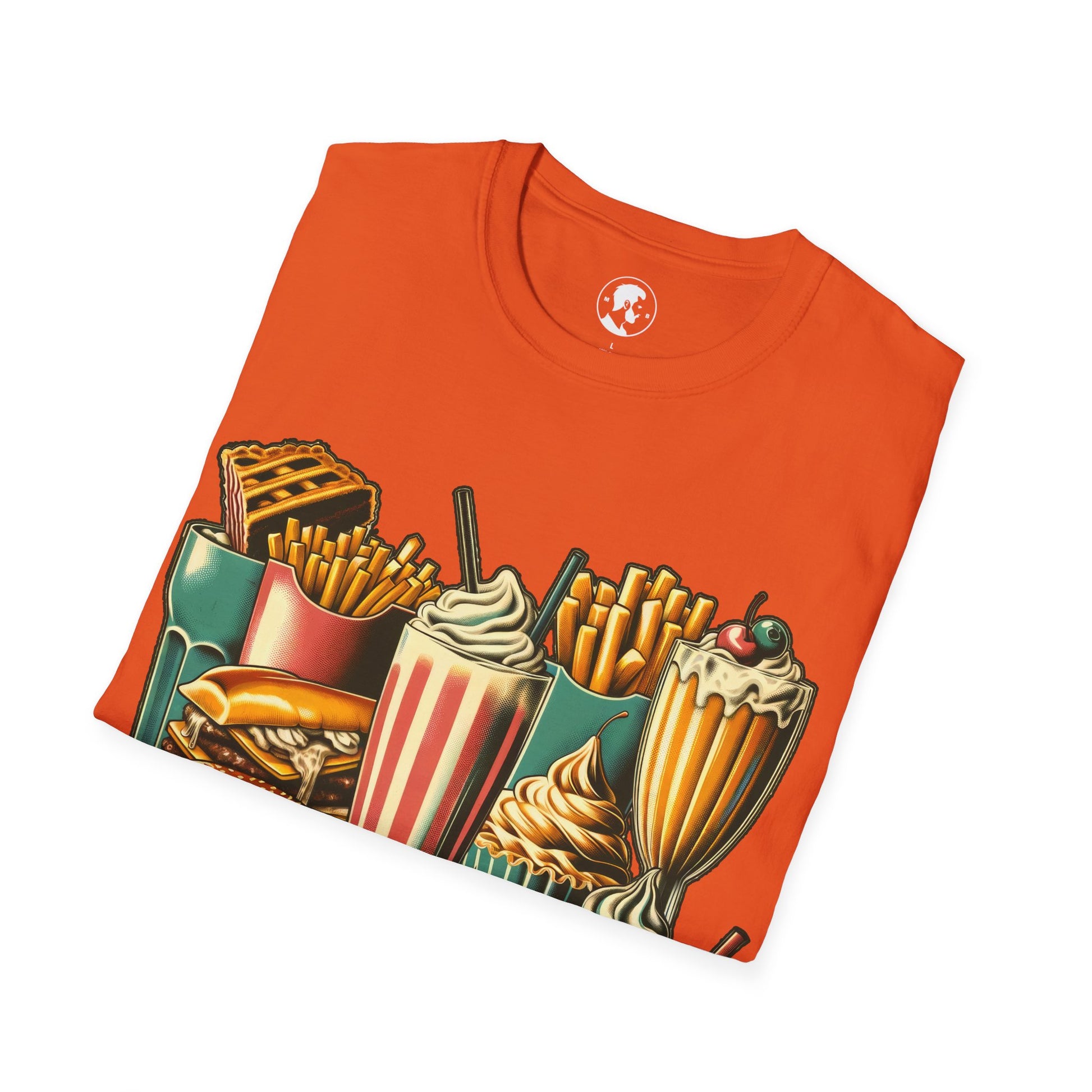 The image shows a T-shirt with a detailed graphic of various fast food items, including a burger, fries, a milkshake, and a cupcake