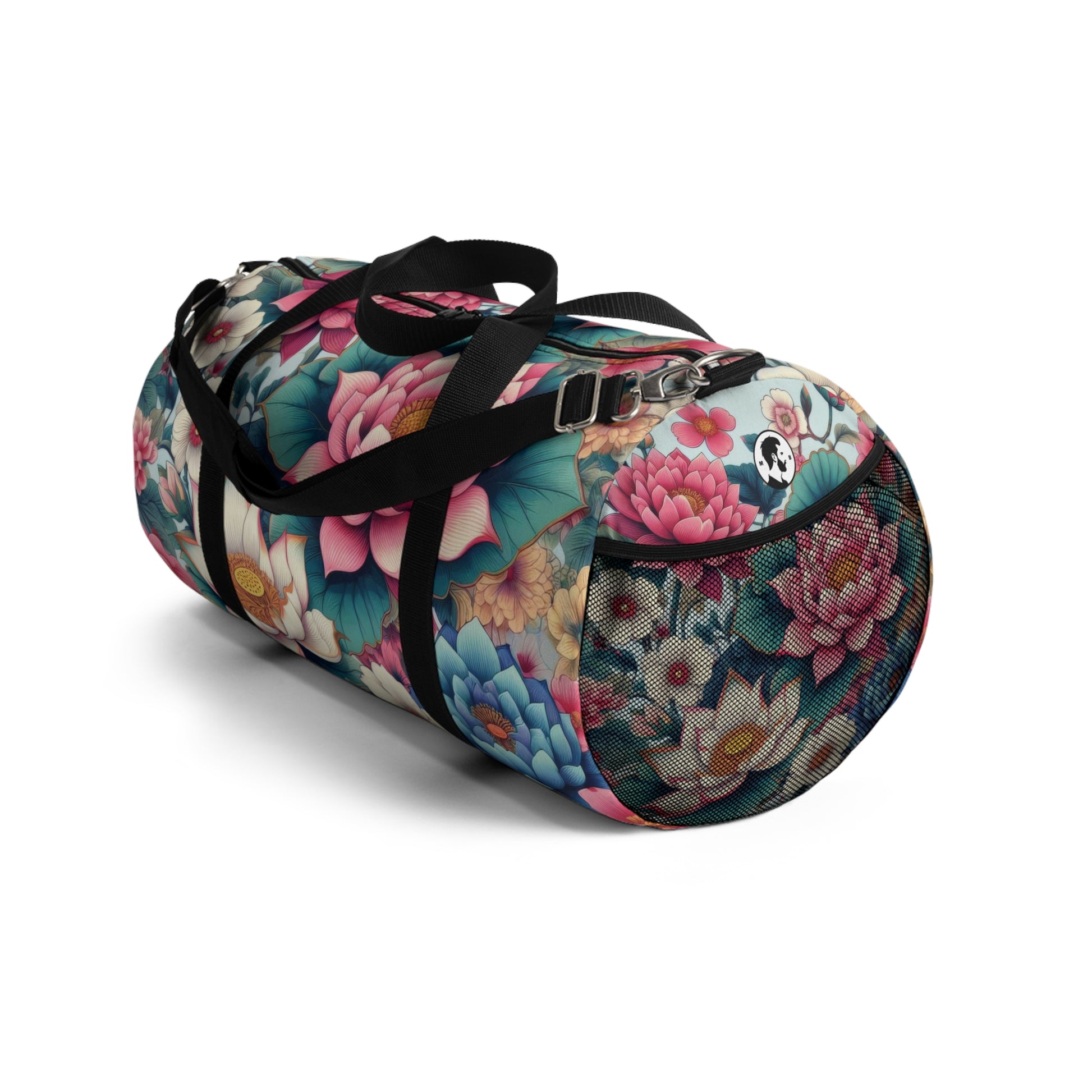 A duffel bag with a vibrant floral pattern featuring large blooms in shades of pink, blue, and white, with green foliage, all set against a dark background. The bag has a black adjustable shoulder strap and black zippers.