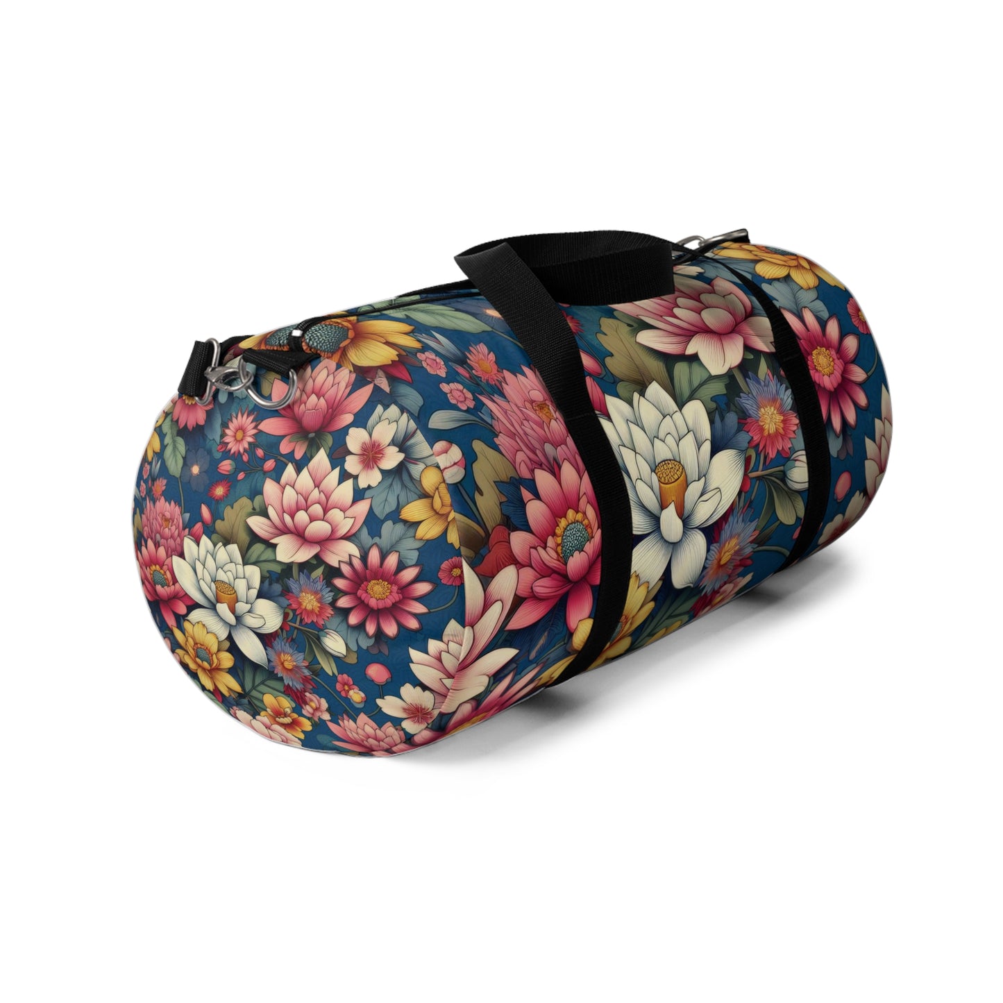 The image depicts a cylindrical duffel bag with a colorful floral pattern and a black shoulder strap.